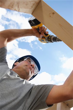 Construction Worker Working Stock Photo - Premium Royalty-Free, Code: 600-01742652