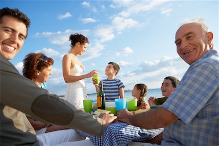 senior man lunch family - Family Eating Outdoors Stock Photo - Premium Royalty-Free, Code: 600-01755501