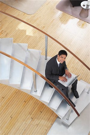 simsearch:600-02756616,k - Businessman on Steps with Laptop Computer Foto de stock - Sin royalties Premium, Código: 600-01753595