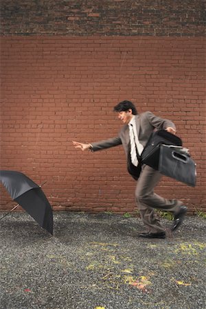 elemento (atmosférico) - Businessman in Wind, New York City, New York, USA Foto de stock - Sin royalties Premium, Código: 600-01764144