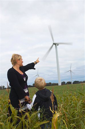 simsearch:700-03698429,k - Mother and Son Looking at Wind Turbines, Denmark Stock Photo - Premium Royalty-Free, Code: 600-01764377