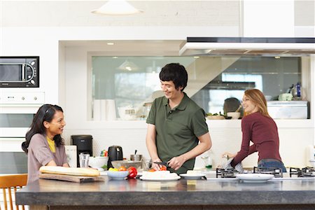 Roommates in Kitchen Stock Photo - Premium Royalty-Free, Code: 600-01764680