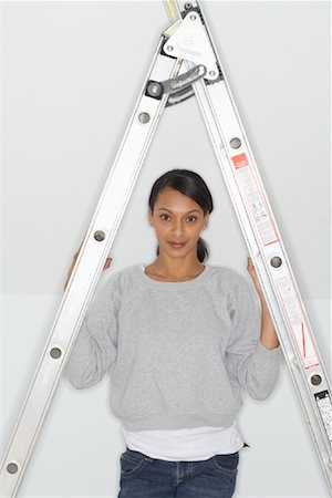 superstition - Woman Standing by Ladder Stock Photo - Premium Royalty-Free, Code: 600-01764716