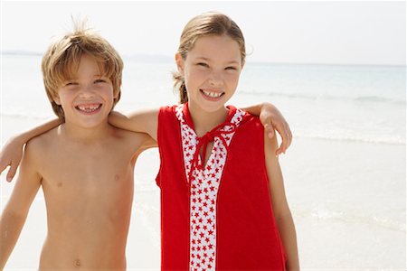 Portrait of Brother and Sister on Beach, Majorca, Spain Stock Photo - Premium Royalty-Free, Code: 600-01764744