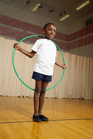 energetic young black people - Boy With Hula Hoop Stock Photo - Premium Royalty-Free, Code: 600-01764812