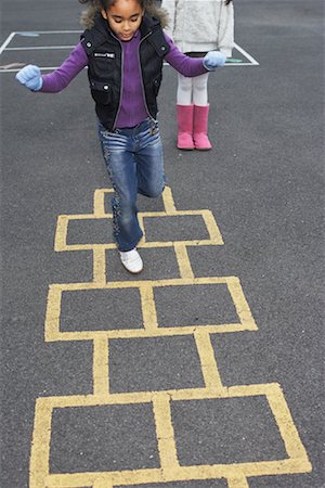 elementary school recess - Girl Playing Hopscotch Stock Photo - Premium Royalty-Free, Code: 600-01764824