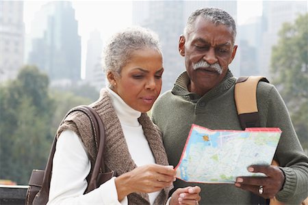 Couple in City with Map, New York City, New York, USA Stock Photo - Premium Royalty-Free, Code: 600-01787320