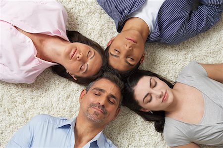 Portrait of Family Lying in a Circle Stock Photo - Premium Royalty-Free, Code: 600-01787705