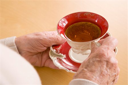 Woman's Hands with Tea Cup Stock Photo - Premium Royalty-Free, Code: 600-01788455