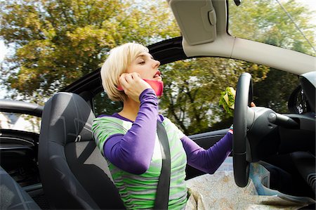 road map - Woman With Road Map, Talking on Cell Phone While Driving Stock Photo - Premium Royalty-Free, Code: 600-01827050