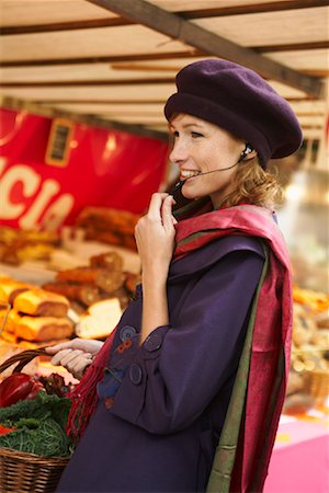 french colors scarf - Woman Wearing Hands Free Headset at Market Stock Photo - Premium Royalty-Free, Code: 600-01827651