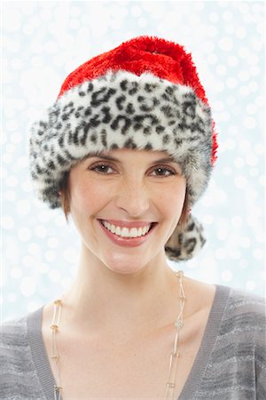 santa claus-mütze - Porträt der Frau tragen Leopard Print Nikolausmütze Stockbilder - Premium RF Lizenzfrei, Bildnummer: 600-01838441
