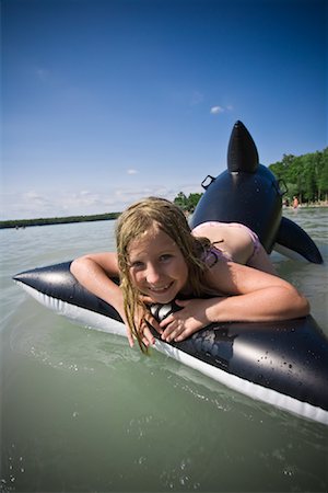 Girl humping inflatable whale