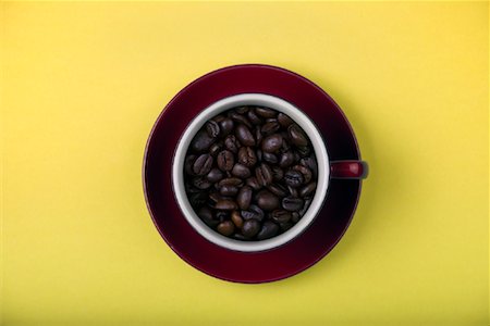 Coffee Cup full of Coffee Beans Stock Photo - Premium Royalty-Free, Code: 600-01954195