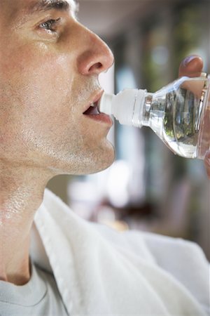 simsearch:400-05115517,k - Man Drinking Water after Exercising Stock Photo - Premium Royalty-Free, Code: 600-01954804