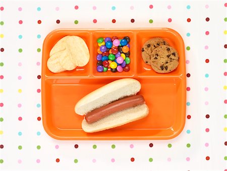 snacks hot dog - Unhealthy Lunch on Plastic Tray Stock Photo - Premium Royalty-Free, Code: 600-01955475