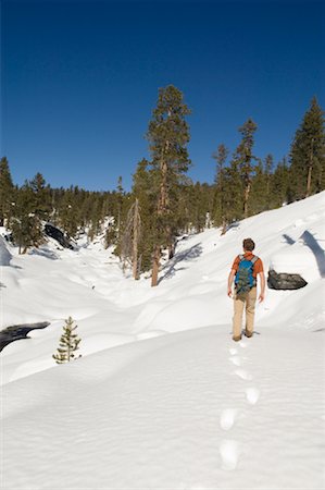 simsearch:693-03643971,k - Man Walking through Snow, Yosemite National Park, California, USA Stock Photo - Premium Royalty-Free, Code: 600-01955581
