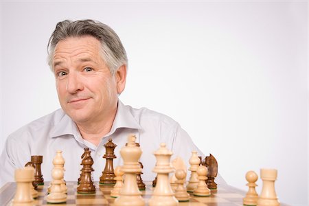 simsearch:700-00075674,k - Man Playing Chess Stock Photo - Premium Royalty-Free, Code: 600-01953770