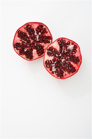 photography only of single fruit - Sliced Pomegranate Stock Photo - Premium Royalty-Free, Code: 600-02033746