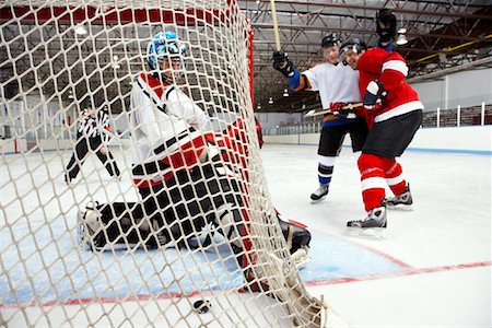 sports and hockey - Hockey Player Scoring Stock Photo - Premium Royalty-Free, Code: 600-02056056