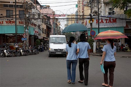 People Walking in City Street, Ho Chi Minh City, Vietnam Stock Photo - Premium Royalty-Free, Code: 600-02063596