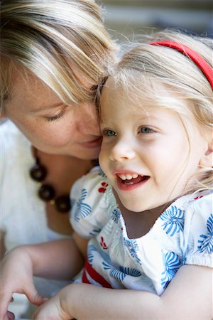 pictures of a little girl whispering - Mother and Daughter Stock Photo - Premium Royalty-Free, Code: 600-02063912