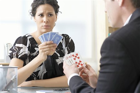 staring at women in office - Business People Playing Poker Foto de stock - Sin royalties Premium, Código: 600-02081686