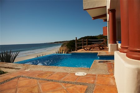 puerto vallarta - Hotel Swimming Pool by Beach, Fairmont Rancho Banderas, Bahia de Banderas, Nayarit, Mexico Stock Photo - Premium Royalty-Free, Code: 600-02121204