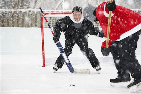 Men Playing Hockey Stock Photo - Premium Royalty-Free, Code: 600-02200119