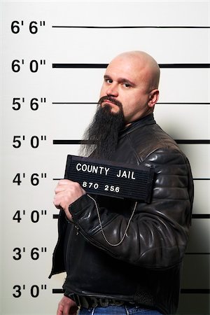 police convict - Mug Shot of Man Stock Photo - Premium Royalty-Free, Code: 600-02201441