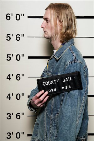 police convict - Mug Shot of Man Stock Photo - Premium Royalty-Free, Code: 600-02201455