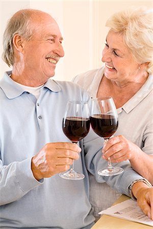 simsearch:600-02346335,k - Couple Toasting with Red Wine Stock Photo - Premium Royalty-Free, Code: 600-02245261