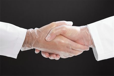 Close-up of Doctors Shaking Hands Stock Photo - Premium Royalty-Free, Code: 600-02245652