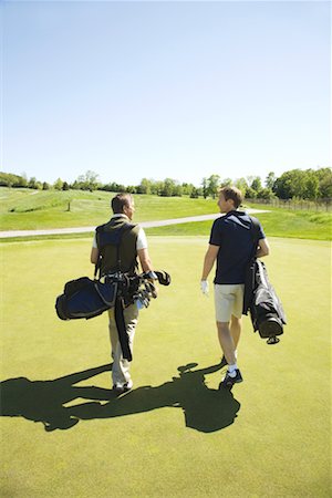 simsearch:600-02935461,k - Golfers on Putting Green Stock Photo - Premium Royalty-Free, Code: 600-02265686