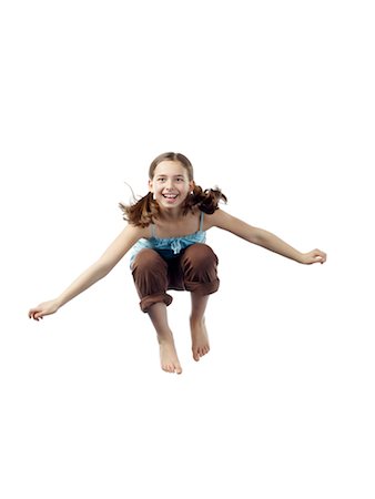 Girl in Mid Air Stock Photo - Premium Royalty-Free, Code: 600-02289190