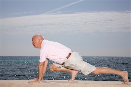 simsearch:700-01199303,k - Man Stretching Outdoors Stock Photo - Premium Royalty-Free, Code: 600-02315005