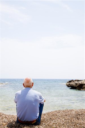 simsearch:700-01163568,k - Man Looking Out to Sea Stock Photo - Premium Royalty-Free, Code: 600-02315011