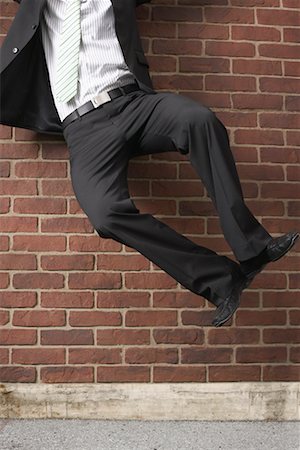 Businessman Jumping in the Air Fotografie stock - Premium Royalty-Free, Codice: 600-02312396