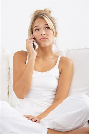 simsearch:600-03244230,k - Young Woman Talking on Cell Phone Stock Photo - Premium Royalty-Free, Code: 600-02312486