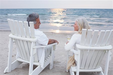 sunrise old woman - Couple Sitting in Chairs on Beach Stock Photo - Premium Royalty-Free, Code: 600-02346332