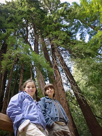 Portrait of Girl and Boy in Front of Giant Redwoods, Muir Woods National Monument, California, USA Stock Photo - Premium Royalty-Free, Code: 600-02347999