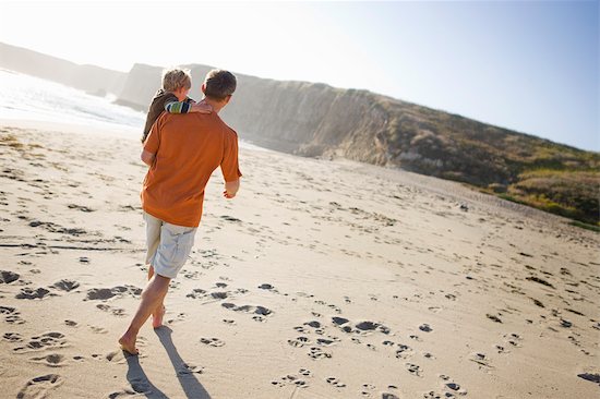 father and son walking. Father and Son Walking on the