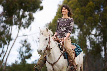 Woman Horseback Riding on Ranch, Santa Cruz, California, USA Stock Photo - Premium Royalty-Free, Code: 600-02376696