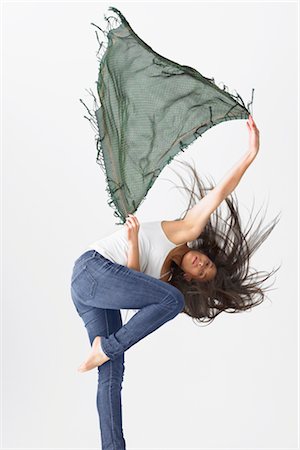 Woman holding Shawl and Dancing Stock Photo - Premium Royalty-Free, Code: 600-02370947