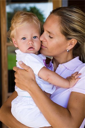simsearch:600-01112884,k - Mother Holding Baby Stock Photo - Premium Royalty-Free, Code: 600-02370990