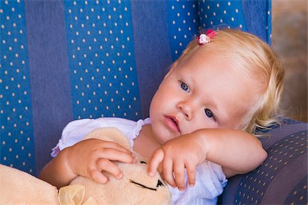 simsearch:700-02586125,k - Toddler with Teddy Bear in Armchair Stock Photo - Premium Royalty-Free, Code: 600-02371044