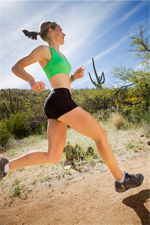 Woman Running on Desert Trail, Saguaro National Park, Tucson, Arizona, USA Stock Photo - Premium Royalty-Free, Code: 600-02385951