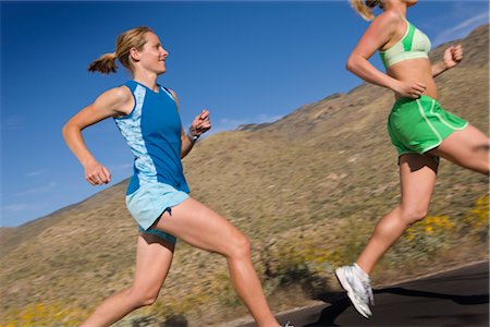 simsearch:700-02245399,k - Woman Running on Paved Road, Saguaro National Park, Tucson, Arizona,USA Stock Photo - Premium Royalty-Free, Code: 600-02385952