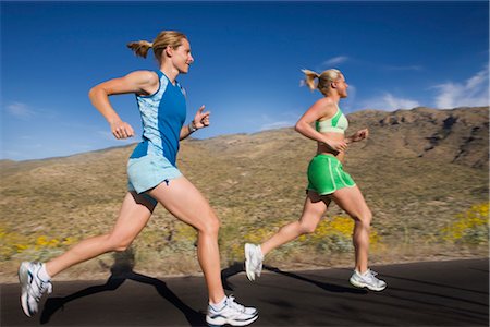 simsearch:700-02245399,k - Woman Running on Paved Road, Saguaro National Park, Tucson, Arizona,USA Stock Photo - Premium Royalty-Free, Code: 600-02385953