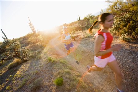 Women Running on Desert Trail, Saguaro National Park, Arizona, USA Stock Photo - Premium Royalty-Free, Code: 600-02385974